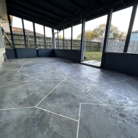 Resurfaced concrete on a patio with flagstone patern
