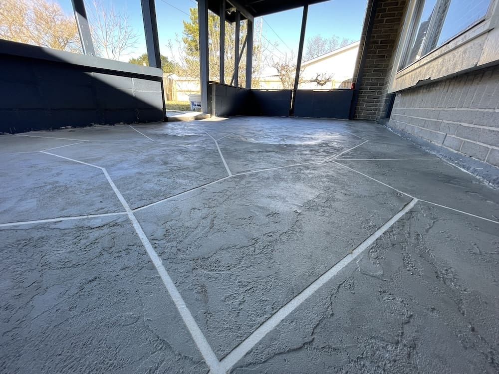 Overlay concrete resurfacing on a backyard patio