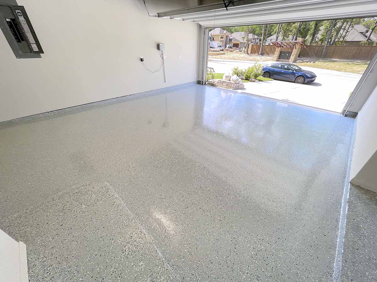 garage floor epoxy with light broadcast