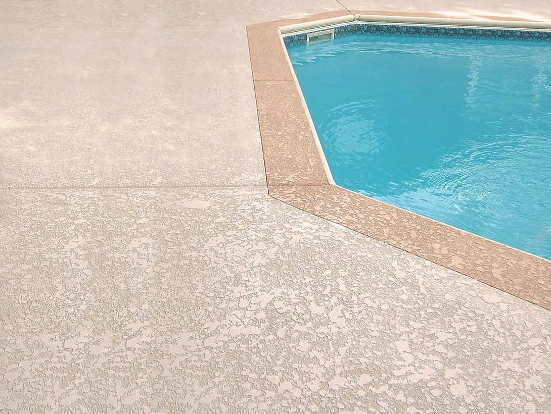 Pool deck resurfacing with cool deck texture