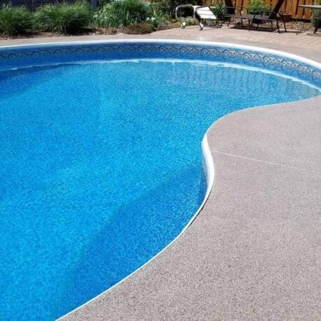 quartz sand pool deck on backyard